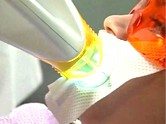 patient using the zoom whitening light